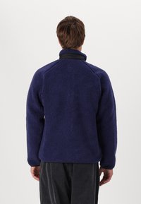 Carhartt WIP PRENTIS LINER - Forro polar - aura/black