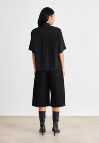 Mads Nørgaard ROBYN - Short en jean - black