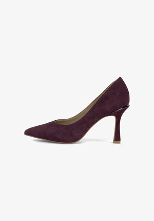 Lila Wildleder-Pumps mit spitzem Zeh und dünnem, schmal zulaufendem Absatz. Verfügt über ein glattes Innenfutter und einen dezenten metallischen Akzent auf der Rückseite.