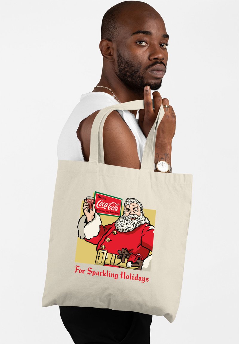 Canvas boodschappentas in natuurlijke kleur met een vintage Santa illustratie, rode jas, witte bontaccenten en de tekst "Voor Sprankelende Feestdagen."
