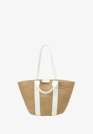 Sac cabas en paille tressée de couleur beige avec des poignées en coton blanches, présentant un grand design ouvert et un fond plat pour la stabilité.