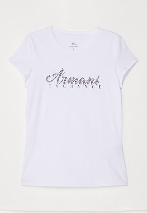 Valkoinen lyhythihainen t-paita, joka on valmistettu puuvillasta. T-paidassa on mustasta rhinestone-kivestä valmistettu logo, jossa lukee "Armani Exchange" etuosassa.