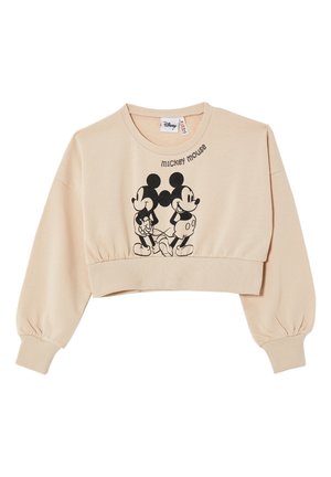 Przycięta beżowa bluza z miękkiego materiału, z czarną grafiką Myszki Miki i tekstem. Żebrowane mankiety i dół dodają konstrukcji.
