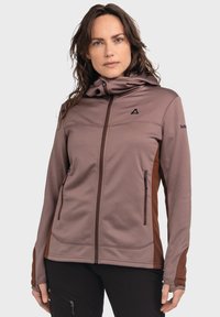 Dunkelmaulbeerfarbenes Jackett mit einer schmalen Kapuze, mit Reißverschlüssen versehenen Taschen und braunen Seitenpanelen. Hergestellt aus strukturiertem Stoff mit einer glatten Oberfläche.