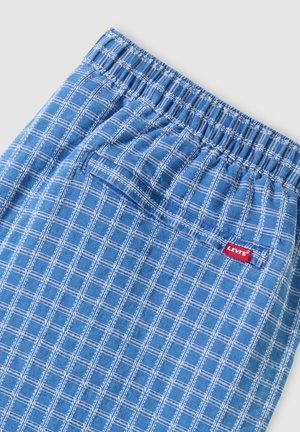 Blå shorts med hvidt ternet mønster, elastisk taljebånd, baglomme og rød Levi's mærkeetiket på lommekanten.