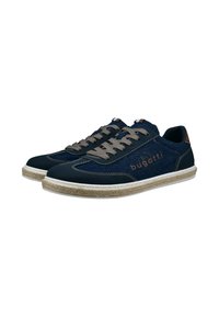 Zapatillas azul marino con tejido texturizado y detalles de cuero. Cordones grises, detalle del logo y suela de yute tejido. Diseño clásico con cordones.