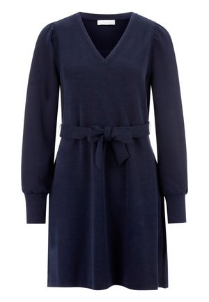 Navyblauwe jurk met een V-hals, lange pofmouwen en een strikceintuur op de taille. Gemaakt van zachte stof met een gladde textuur.