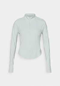 Světle zelený sportovní top s dlouhými rukávy, čtvrtinovým zipem a raglánovými rukávy. Hladká textura a jemné logo Nike na hrudi.