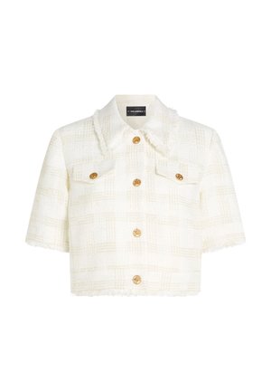 Veste blanche courte en tissu texturé avec un motif à carreaux. Comprend un col, des manches courtes et des accents de boutons dorés.