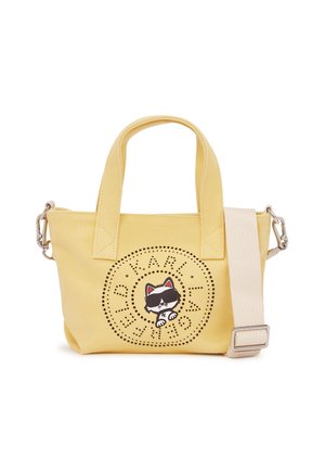 Lille gul mulepose med to hanke, aftagelig justerbar hvid skulderrem og sort kat med solbriller logo på forsiden.