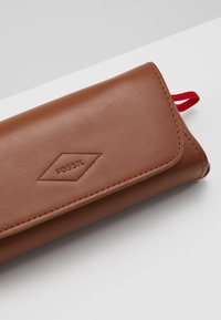 Fossil Ochelari de soare - rose gold-coloured