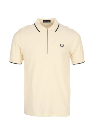 Cremefarbenes Polohemd mit kurzen Ärmeln, schwarzem Besatz an Kragen und Bündchen, silbernem Reißverschluss vorn und besticktem Lorbeer-Logo auf der Brust.