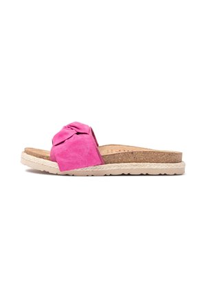 Pink suede slide sandal with a textured bow detail, cork insole, and natural jute-like sole, featuring a flat and casual design.