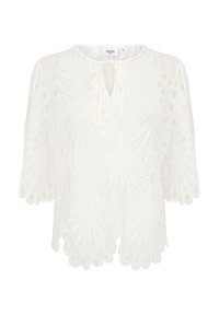 Blusa bianca in pizzo con intricati ritagli circolari e a ventaglio, colletto con laccetto, e maniche corte a campana.