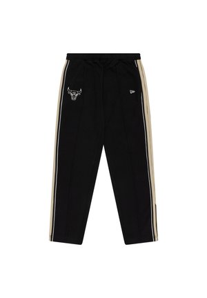 Black sweatpants with beige side stripes, featuring an embroidered bull logo and a New Era tag on the waistband. Soft, elastic material.