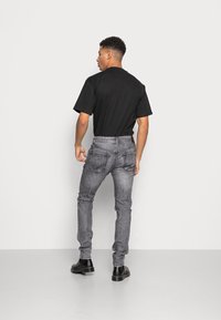 Pepe Jeans STANLEY - Calças de ganga justas - grey denim