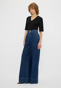 adL PLEATED WIDE LEG  - Wide leg - NAVY BLUE