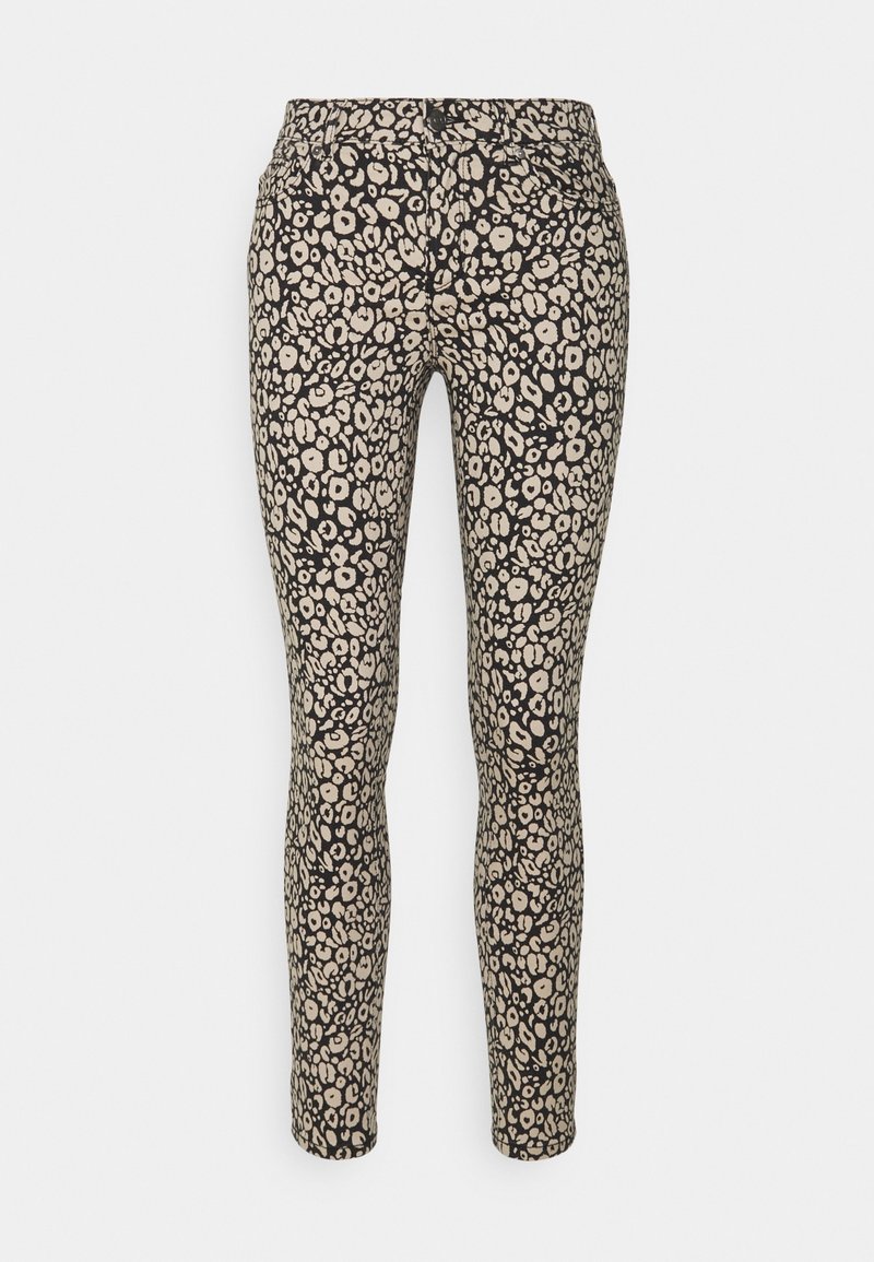 Leggings neri con un motivo floreale beige, dal design attillato e texture liscia, che si stringono alla caviglia.