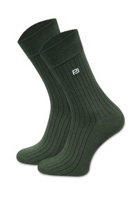 Ciemnozielone skarpetki prążkowane z wzmocnionym palcem i piętą, z małym białym logo po boku. Wykonane z miękkiego, elastycznego materiału.