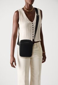 Tommy Hilfiger MINI REPORTER UNISEX - Bandolera - black
