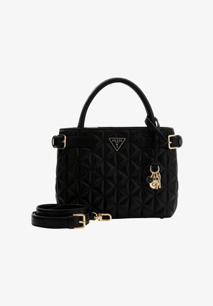 Sac à main matelassé noir en matériau synthétique, avec un logo triangulaire, une quincaillerie dorée et une bandoulière amovible.