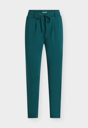 Teal joggingbukser lavet af glat, elastisk stof. Har elastisk taljebånd med snøre og sidelommer. Konisk ben-design.
