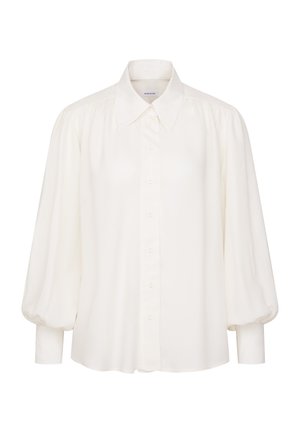 Blouse blanche à manches longues avec manches bouffantes, boutonnée sur le devant, col pointu et poignets ajustés.