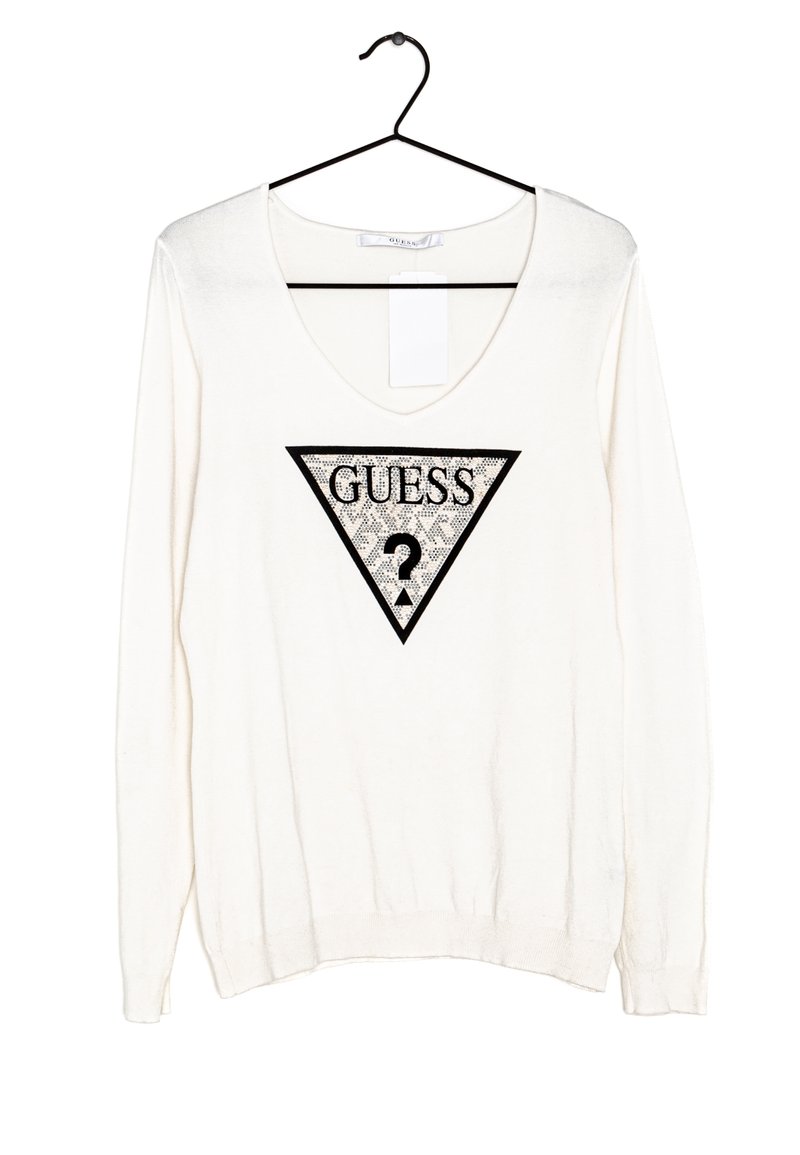 Maglione bianco a maniche lunghe con scollatura a V profonda. Presenta un logo triangolare nero con il testo "GUESS" e un motivo di punti interrogativi all'interno.