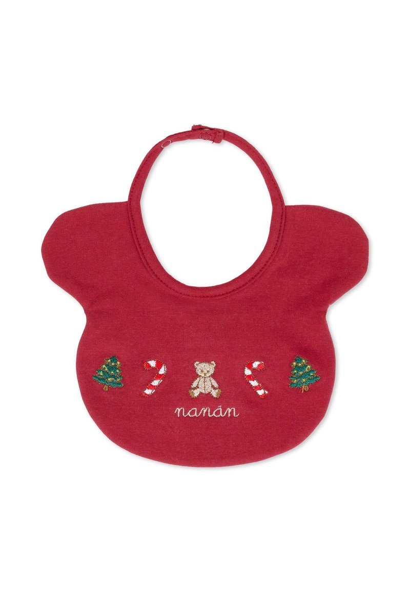 Bavoir en coton rouge avec des motifs brodés d'un ours en peluche, de sapins de Noël verts et de cannes en sucre, avec le texte "nanan" cousu en dessous.