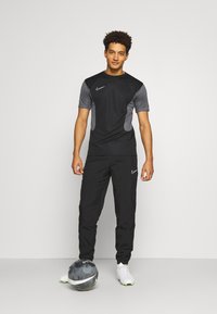 Nike Performance ACEDEMY PANT - Jogginghose - black/white