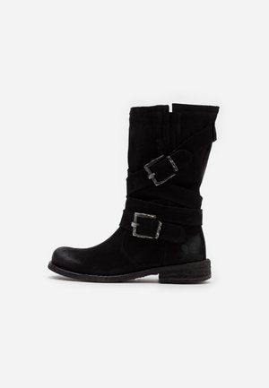 Kowbojki i obuwie motocyklowe