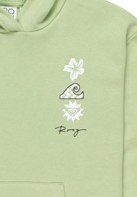 Felpa verde chiaro con grafiche floreali e onde bianche, e scritta "Roxy". Progettata con una tasca a marsupio e una texture accogliente.