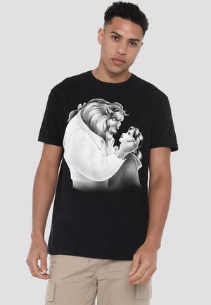 Black cotton t-shirt featuring a monochrome illustration of a beast holding a young woman, emphasizing detailed facial expressions and forms.