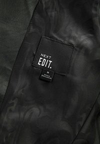 Next REGULAR FIT  - Chaleco - black