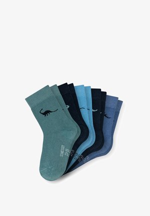 Ein Packung mit sieben gestrickten Socken in verschiedenen Blau- und Grüntönen, die kleine Dinosauriermuster an der Seite aufweisen. Mit gerippten Bündchen und strukturiertem Gewebe.