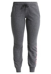 Grijze fleece joggingbroeken met een elastische tailleband, zijzakken en roze letters op het linkerbeen. Boorden bij de enkel met een gladde textuur.