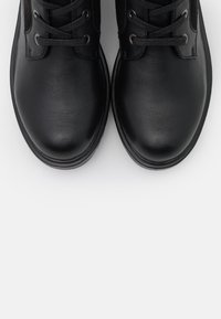 Rieker Botas con plataforma - black