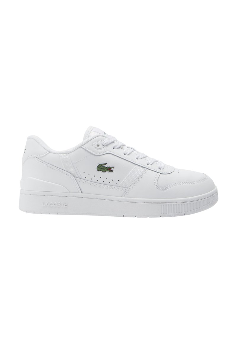 Sneakers bianchi in pelle con design perforato, suola piatta bianca e logo coccodrillo verde Lacoste sul lato. Presenti lacci e colletto imbottito.