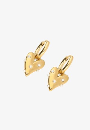 Gold heart-shaped earrings with small white pearls, featuring a textured surface and hoop attachment for secure wear.