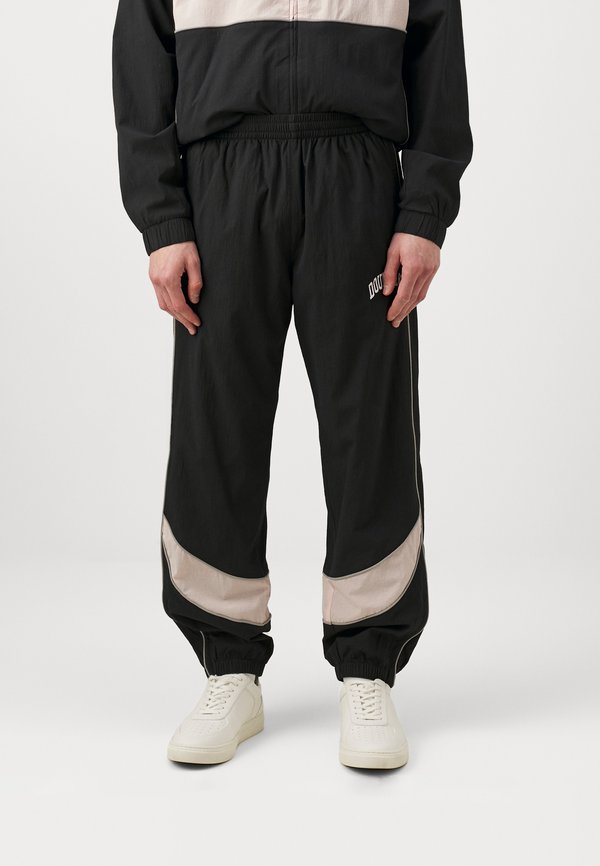 IVY TRACKPANTS UNISEX - Tracksuit bottoms