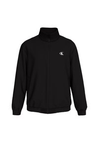 Svart zip-up jacka med hög krage, elastiska manschetter och fåll, samt en liten vit "cK" logotyp på vänster bröst.
