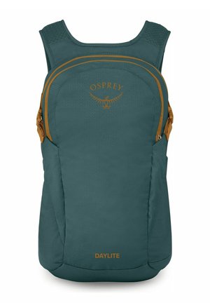 Zaino turchese compatto con spallacci imbottiti, dettagli con cerniere marroni e logo "Osprey Daylite" sul pannello frontale.