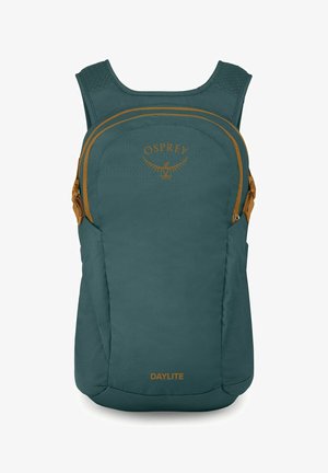 Sac à dos compact de couleur sarcelle avec bretelles rembourrées, accents de fermeture éclair marron et logo "Osprey Daylite" sur le panneau avant.