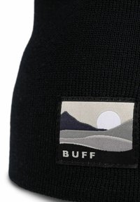 Black knit beanie featuring a rectangular logo patch with a mountain and sun design in gray, white, and black tones.