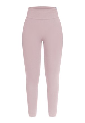 Leggings taille haute rose clair en tissu extensible, dotés d'une texture lisse et d'un design ajusté sans coutures visibles.