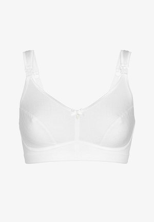 Vit trådlös bh med kviltad textur, justerbara axelband och en liten rosett i mitten. Har en slät yta och knäppning med hak och ögla.