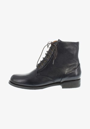Black leather ankle boot with a rounded toe, lace-up front, brass eyelets, and a textured finish. Low stacked heel.