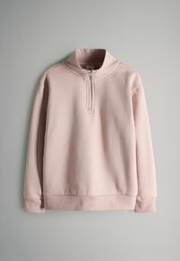 Světle růžová mikina na zip s vysokým límcem, žebrovanými manžetami a hladkým povrchem. Má krátký zip vpředu. Jednoduchý design.