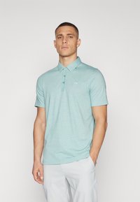 TravisMathew - THE ZINNA - Poloshirts - heather beryl green Miniaturebillede 1