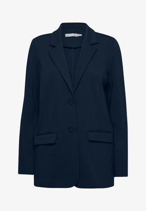Marineblauwe blazer met een geknoopte revers, twee voorzakken en twee knopen. Gladde stof met een getailleerde vorm en strakke lijnen.